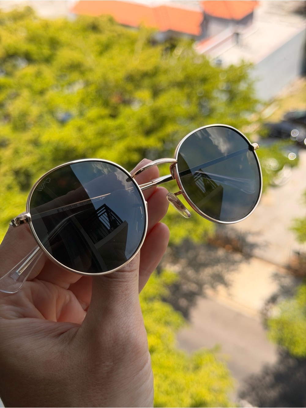 Round Silver Frame Sunglasses with Dark Lenses